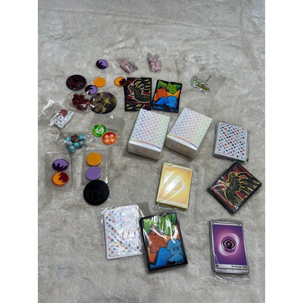 Pokémon Trading Card game and misc Pokemon supplies